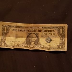 A silver certificate P99637628 A one dollar bill